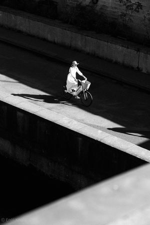 Woman biking in Paris